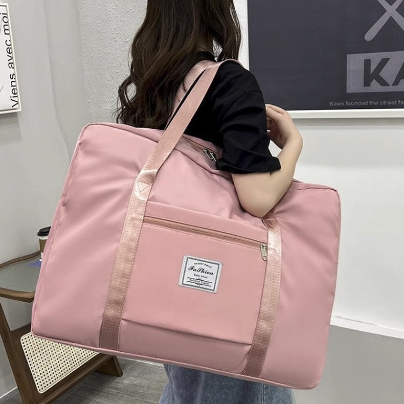 The large-capacity travel bag is portable