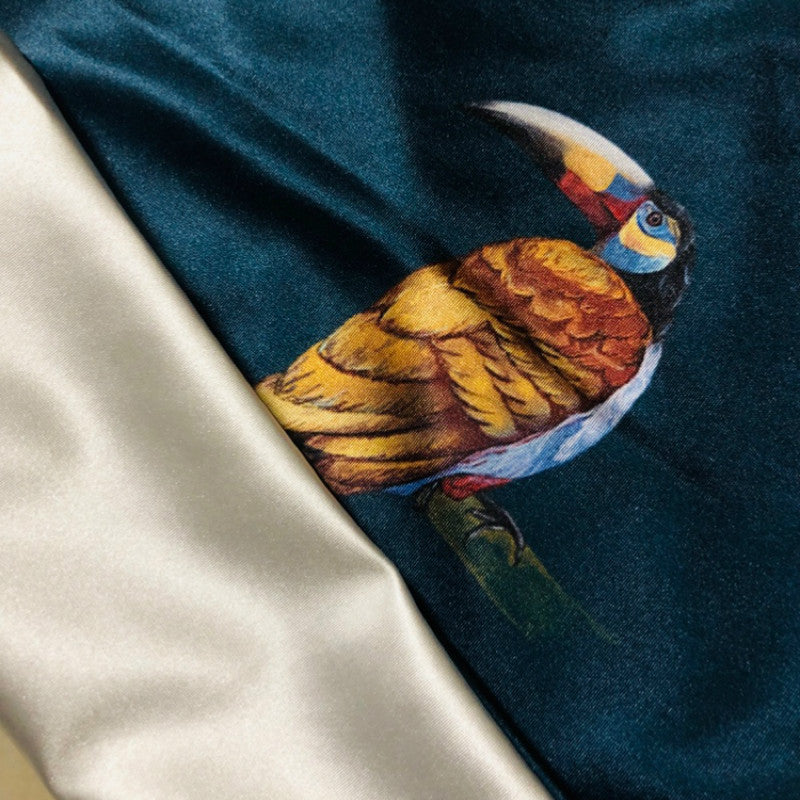 Modern rainforest bird green leaf print cushion cover