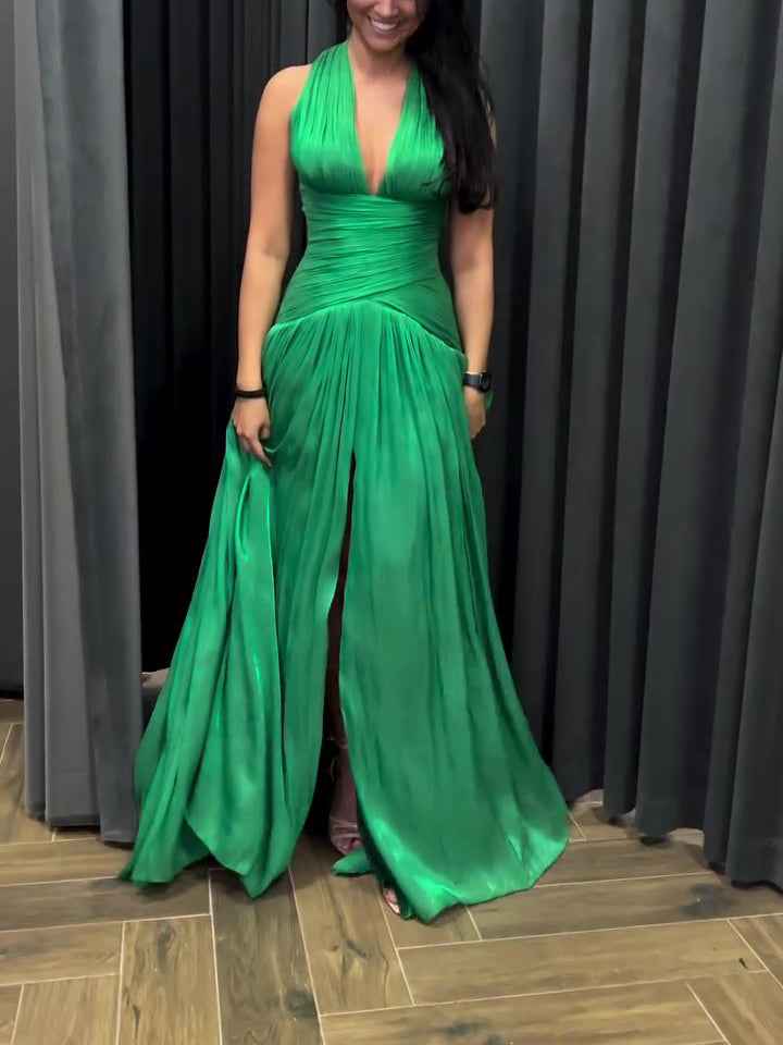 Emerald Green Plunging Neckline Gown With Pleated Skirt And Side Slit