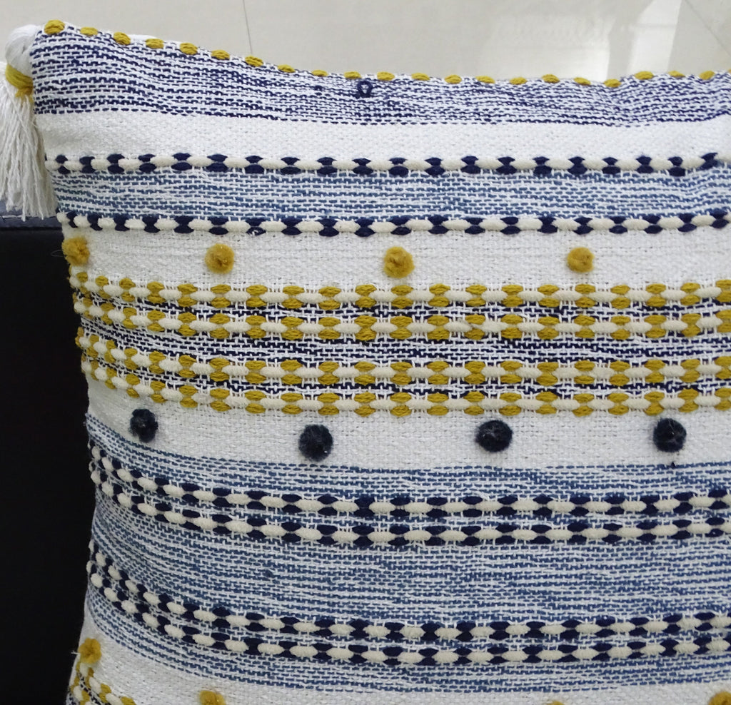 Coussin design rayé avec mini pompons et glands 50x50 cm