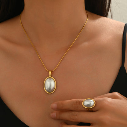 Lxalry Golden Jewelry Set - Elegant Necklace & Ring Combo With Oval Design, Metal Polished Finish, Perfect For Both Day & Night Occasions - DropOnline.co
