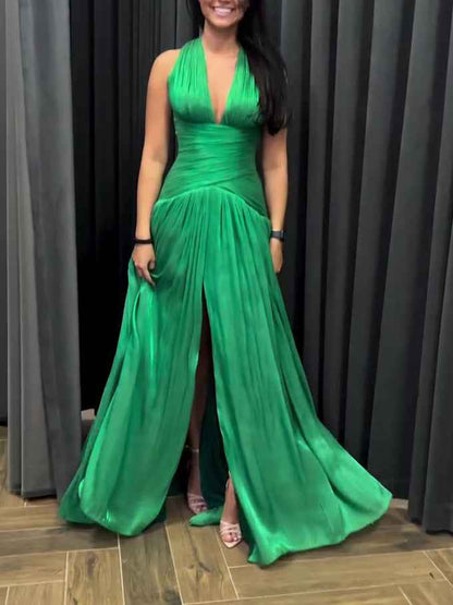 Emerald Green Plunging Neckline Gown With Pleated Skirt And Side Slit