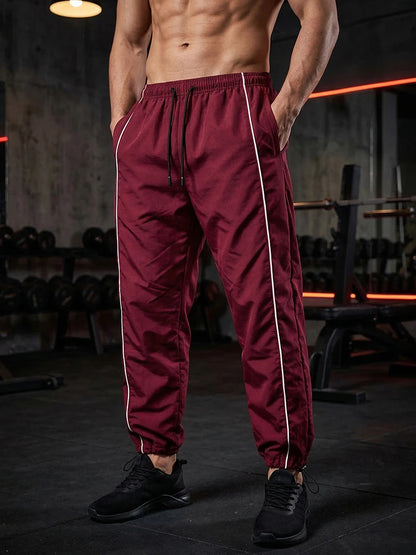 Men's Trendy Sporty Pants with Lines Gym Workout Running Trousers with Side Pockets Athletic Quick-Dry Breathable Sweatpants