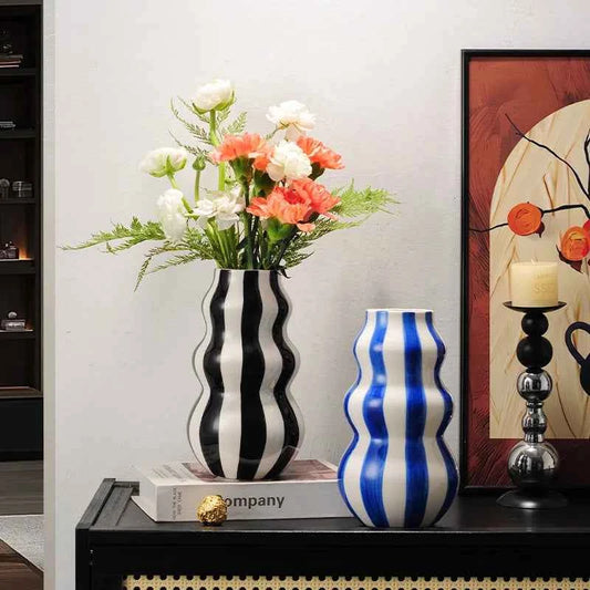 Modern niche minimalist striped vases, flower arrangements in them, high-end sense, creative retro painted ceramic vases