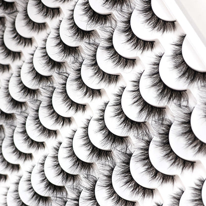 Rows of 3D false eyelashes in white trays, showcasing multi-layered, realistic, soft, comfortable lashes.
